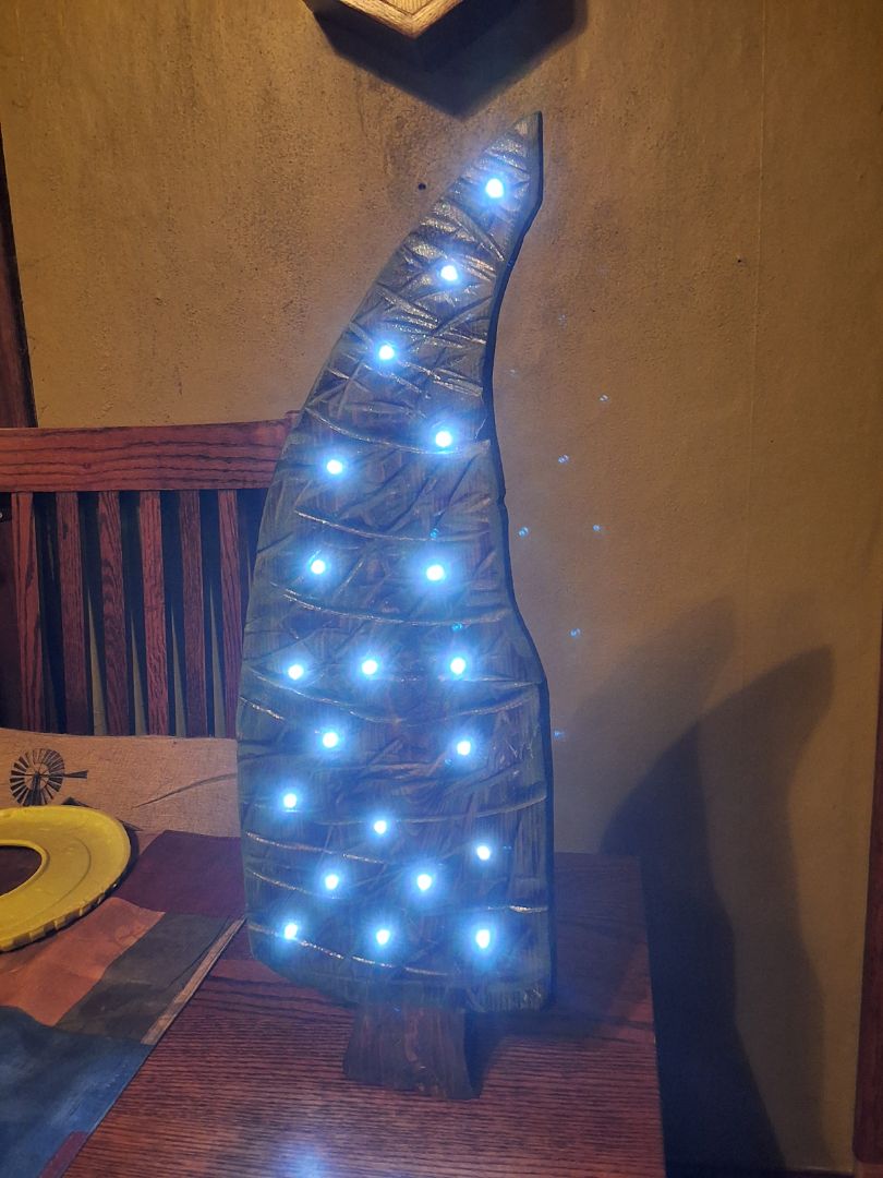 (1) CHRISTMAS Lighted Christmas tree, 21" x 8"