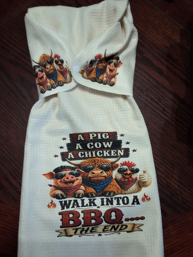 Off white Hand towel with snap A PIG,A COW A CHICKEN WALK INTO A BBQ