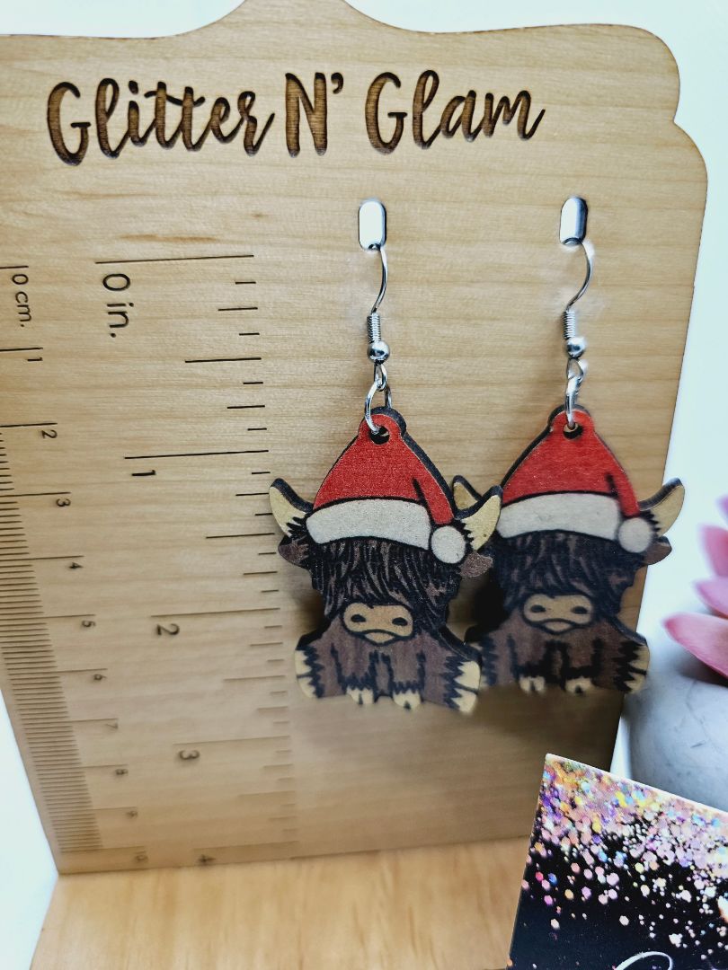 Glitter N Glam 1968 Wooden Highland Cow Dangle Earrings with Santa Hat
