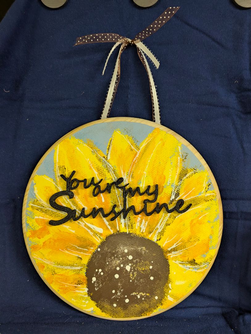 Sunflower on wood adj