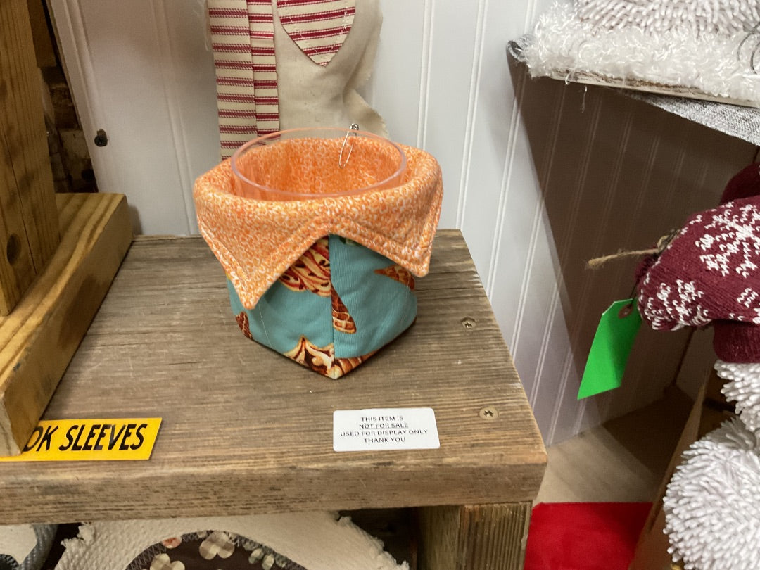Orange/Teal Ice cream cozy w/cup.