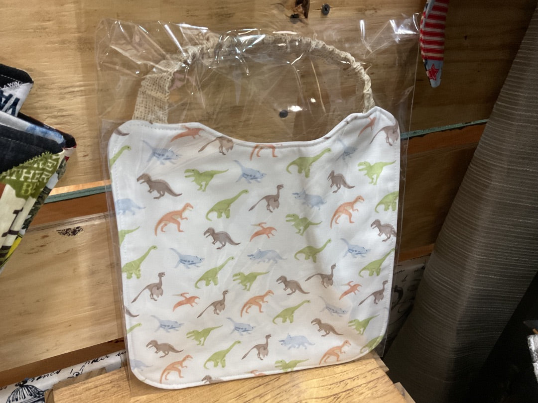 Cream “Dinosaurs” Bib