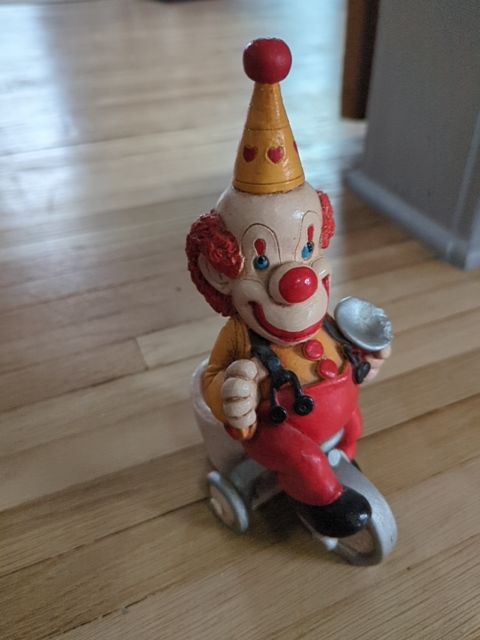 Clown Riding Bike