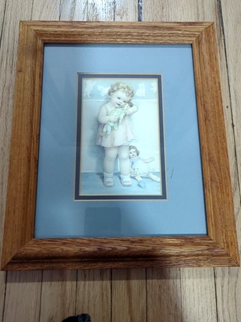 Doll play framed print