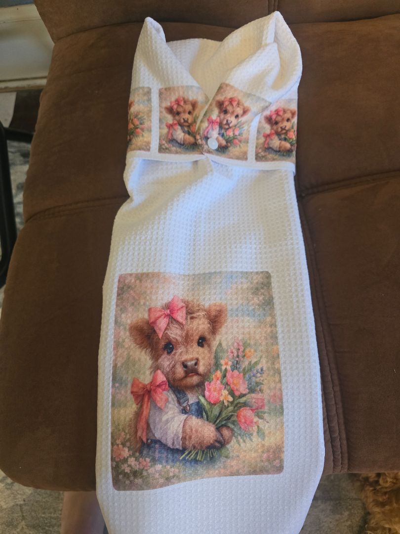 Hand towel with snap Cow holding flowers