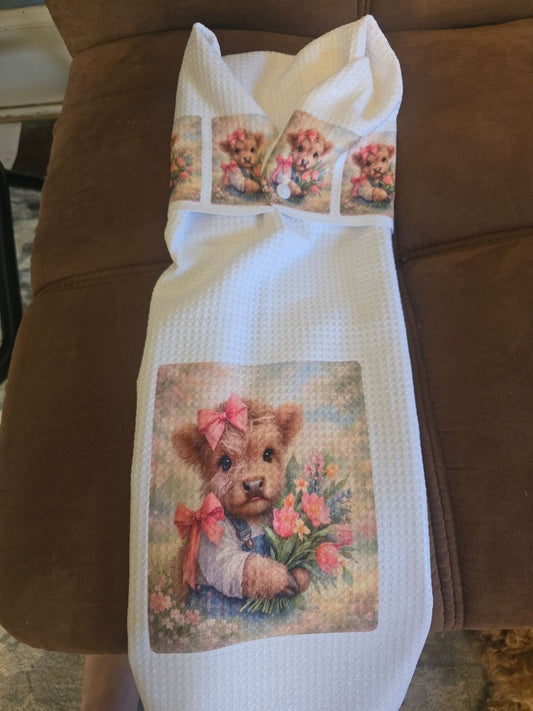 Hand towel with snap Cow holding flowers