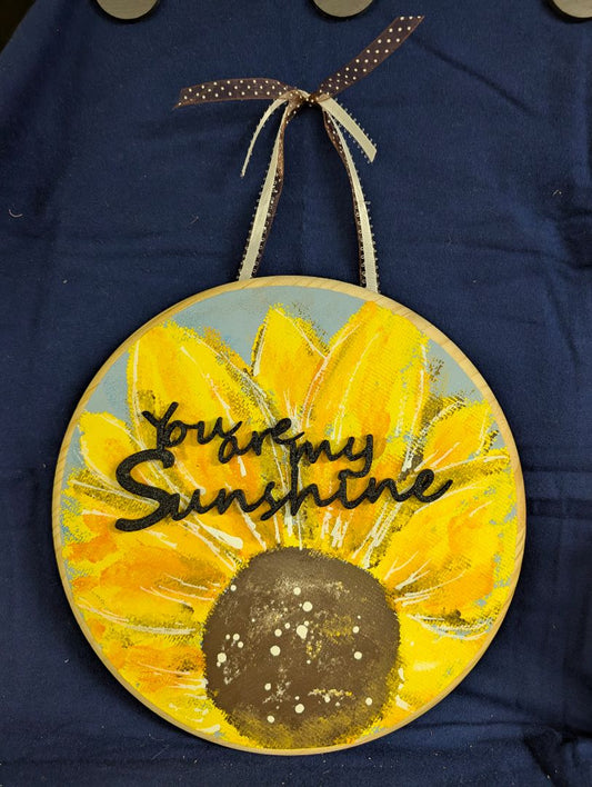 Sunflower on wood adj