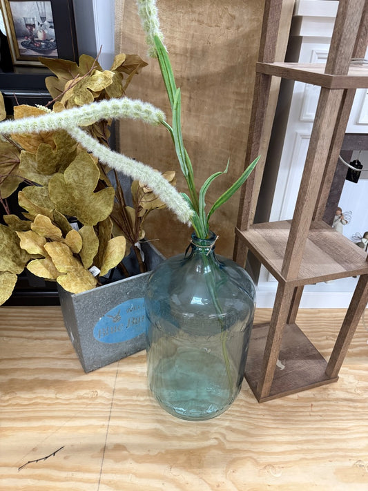 blue vintage blue glass jug with stem
