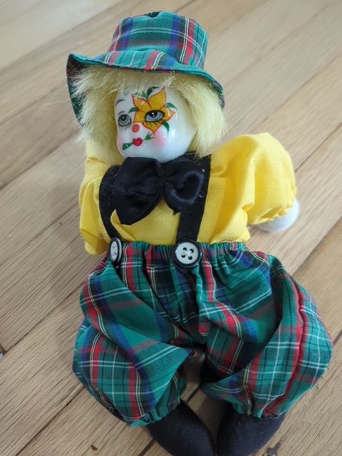 Porcelain clown doll