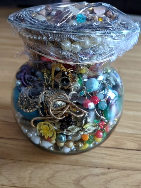 Broken and mismatched jewelry jar