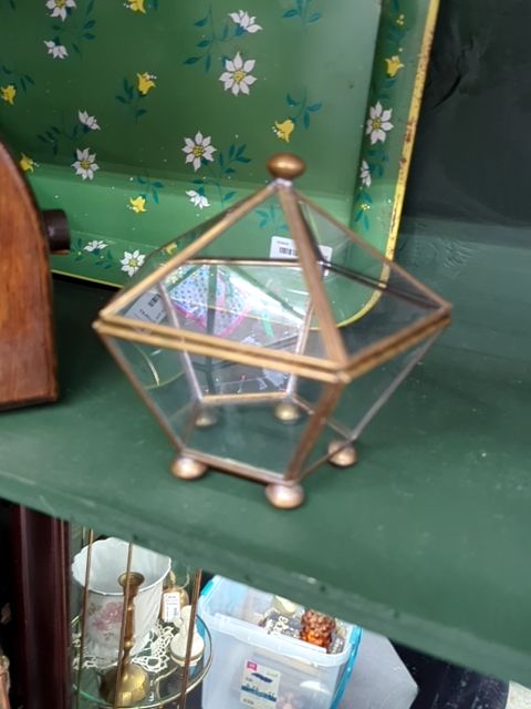 Glass and brass storage