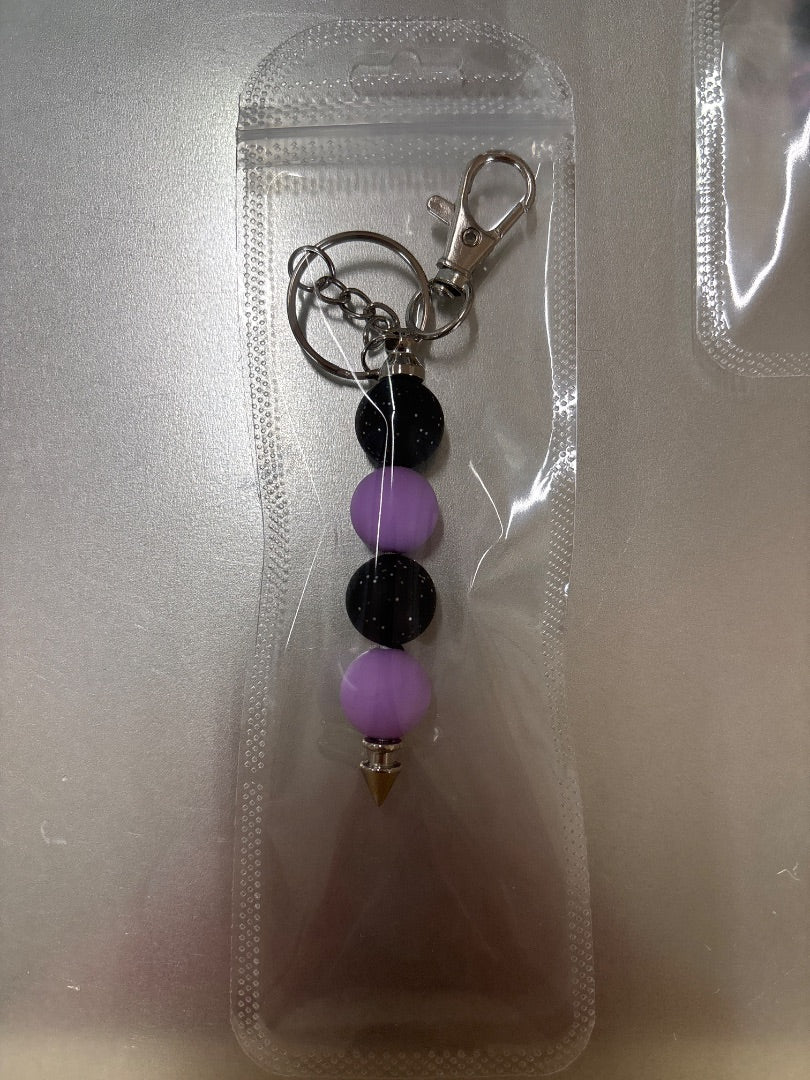 purple/black sparkle beaded keychain Amira’s dog treats