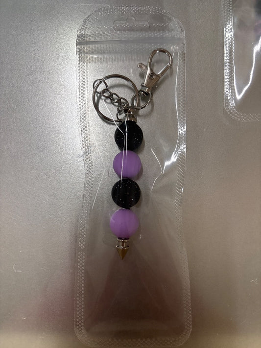 purple/black sparkle beaded keychain Amira’s dog treats